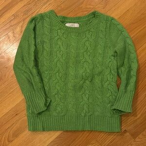 Women’s cable knit sweater